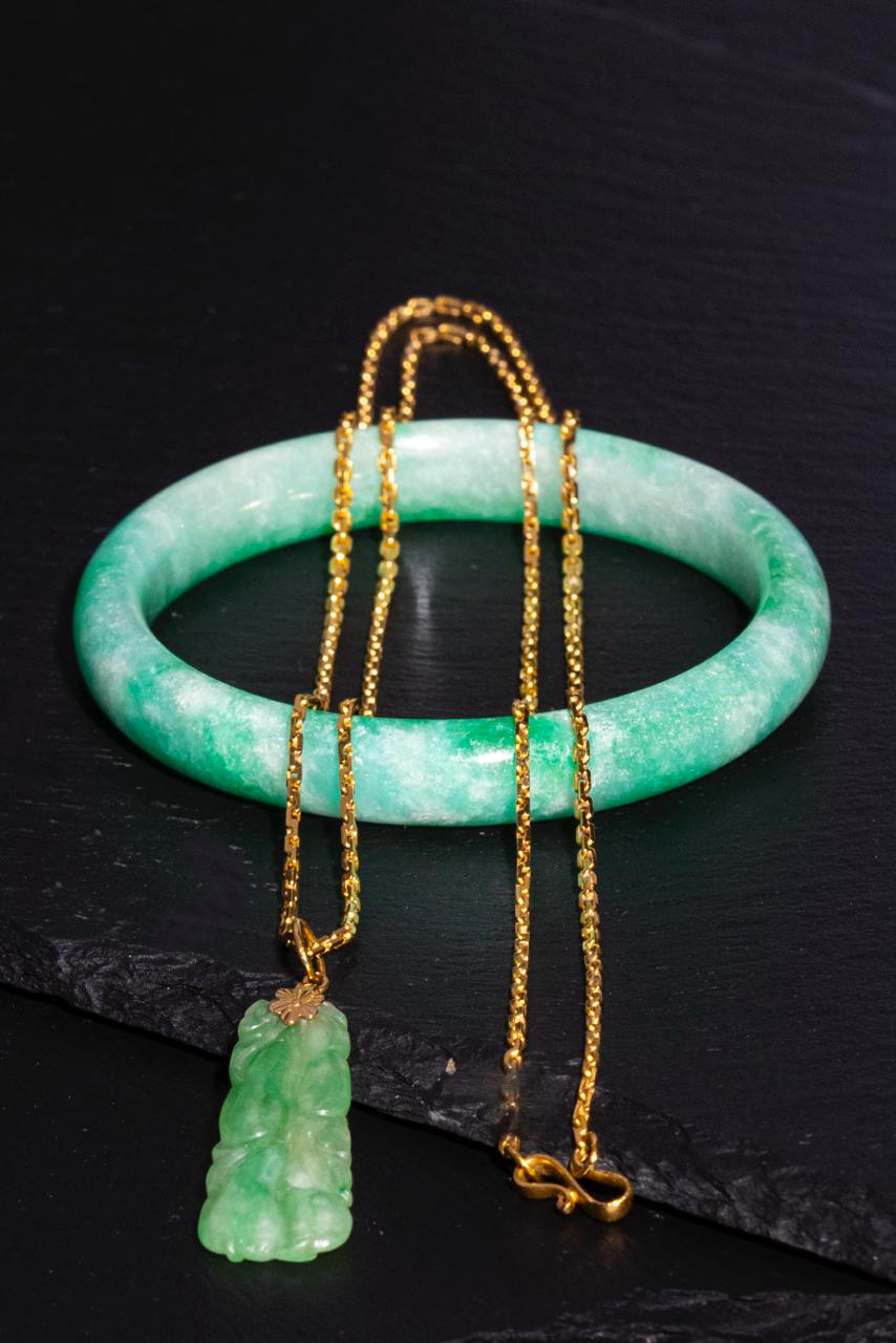 Natural Type A jadeite necklace on a 22 carat gold chain
